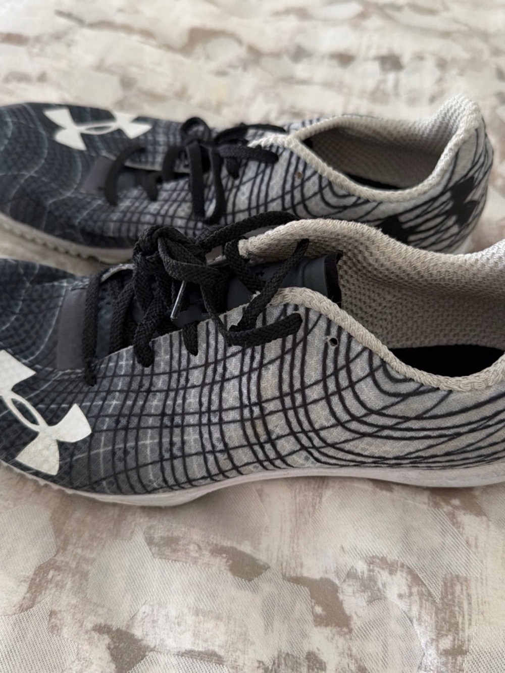 Under Armour Kids Black and White track & field spikes